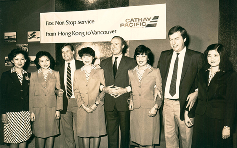 Senior Cathay Pacific executives are among the arrival party in Vancouver after the inaugural flight in 1983