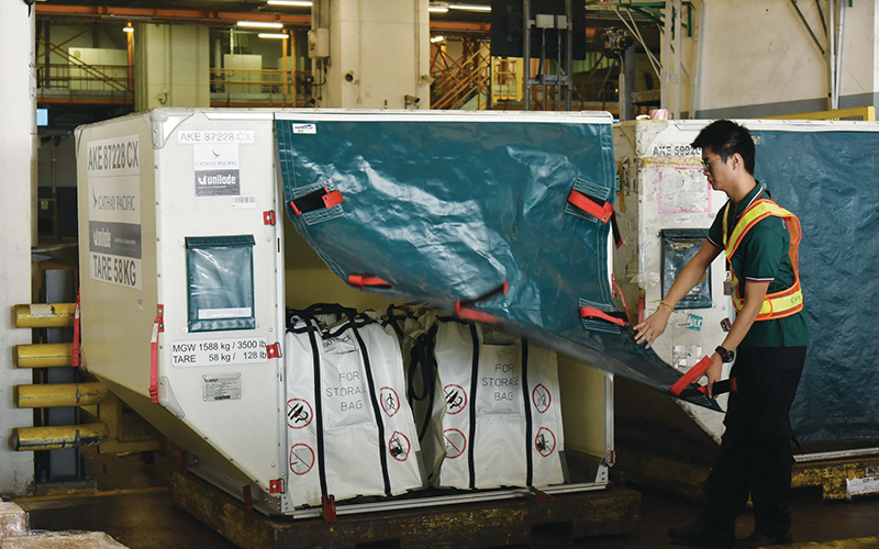 Cathay Cargo’s FAA-approved Fire Containment Bags being loaded at the Cathay Cargo Terminal