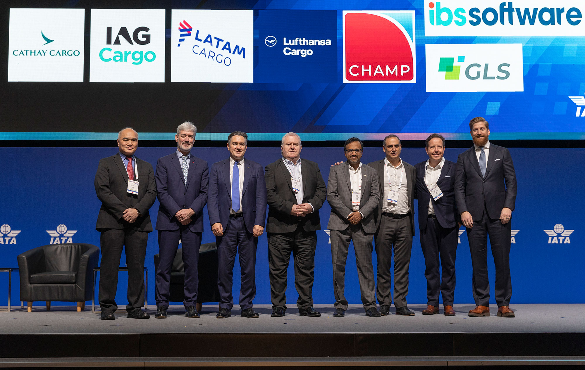 Global Logisitics System HK Co Ltd Chief Executive Simon Ng (left) and Director Cathay Cargo Tom Owen (third from left) on stage at WCS as co-signatories to IATA’s Digitalization Leadership Charter