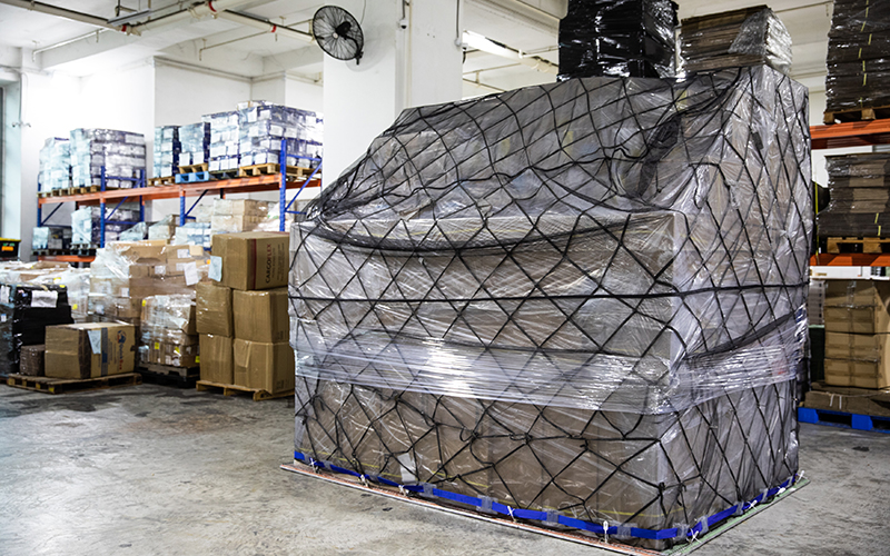 Cathay Cargo Terminal processes around 10 million plastic cargo sheets that keep shipments secure and waterproof in a year